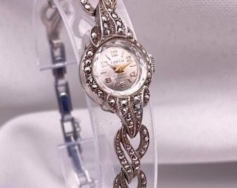 Vintage jaren 1950 sterlingzilveren marcasiet ingelegd damespolshorloge: handmatig opwindbaar, wervelende armbandband van LANCO