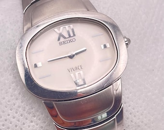 Vintage SEIKO Vivace Quartz Watch: Stainless Steel T.V. Case, White Dial, Original Seiko Strap