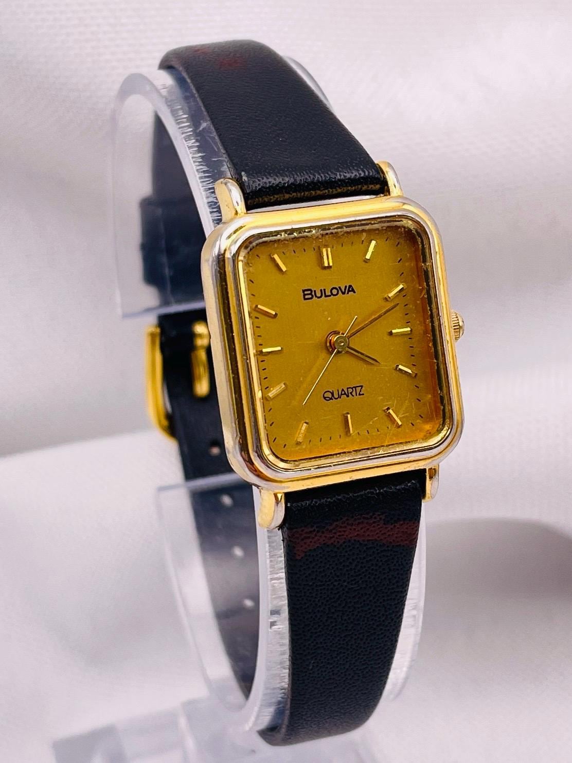 Vintage 1980s Bulova Ladies Quartz Watch: Gold-tone Rectangular