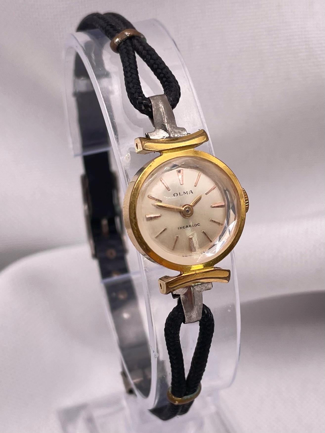 Olma swiss watch - Etsy 日本