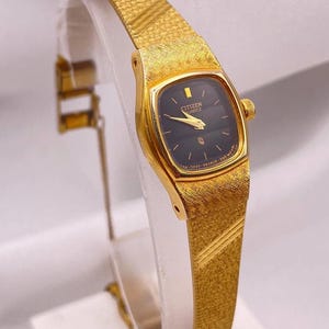 Vintage dames CITIZEN-polshorloge uit de jaren 80 (van Seiko) vergulde handopwinding vierkante zwarte wijzerplaat met diamanten