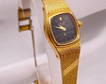 タテオシアン　ウォッチ　カフス　ゴールド Citizen Womens Quartz Watch 4-833571 Seven Gold Tone Band