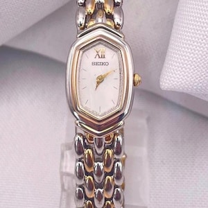 1990&#39;s Vintage Ladies SEIKO Quartz Wristwatch White and Yellow Gold Plated Marquis Shaped Case with Beads of Rice Bracelet New Battery