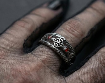 Handcrafted Celtic Knot Ring in Sterling Silver: Gothic Infinity Design with Red Stone Accents