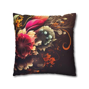 May include: A decorative throw pillow with a floral design. The pillow features a dark background with colorful flowers in shades of red, pink, yellow, and green.