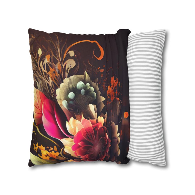 May include: Two decorative pillows, one with a floral pattern on a dark background and the other with white stripes on a gray background.