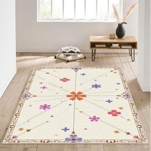Alfombra floral minimalista con motivos florales radiantes y líneas caprichosas, alfombra ligera estilo dibujos animados para habitaciones infantiles o espacios de juego.
