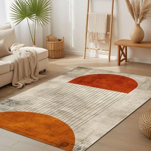 Alfombra geométrica retro naranja con espirales de mediados de siglo, moderna y atrevida en naranja quemado para sala de estar, lavable y antideslizante.