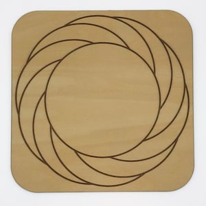 May include: A square wooden coaster with a circular design of concentric circles, creating a swirling pattern.