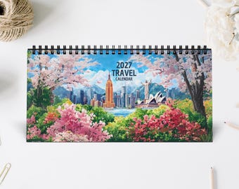 Pode incluir: Um calendário de viagens de 2027 com encadernação em espiral preta, apresentando uma ilustração colorida de um horizonte urbano com o Empire State Building, o Cristo Redentor e a Ópera de Sydney rodeados por flores de cerejeira e folhagem.