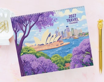 May include: A 2027 travel calendar featuring a colorful illustration of the Sydney Opera House and city skyline. The scene includes vibrant purple jacaranda trees in the foreground, blue water, and a clear sky. The text 2027 TRAVEL CALENDAR is printed.
