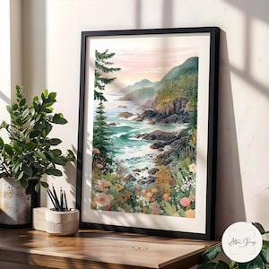 May include: A framed art print depicts a coastal landscape with a vibrant ocean, rocky shoreline, and lush green mountains. The artwork features a variety of colorful wildflowers in the foreground, with a soft, pastel-colored sky in the background.