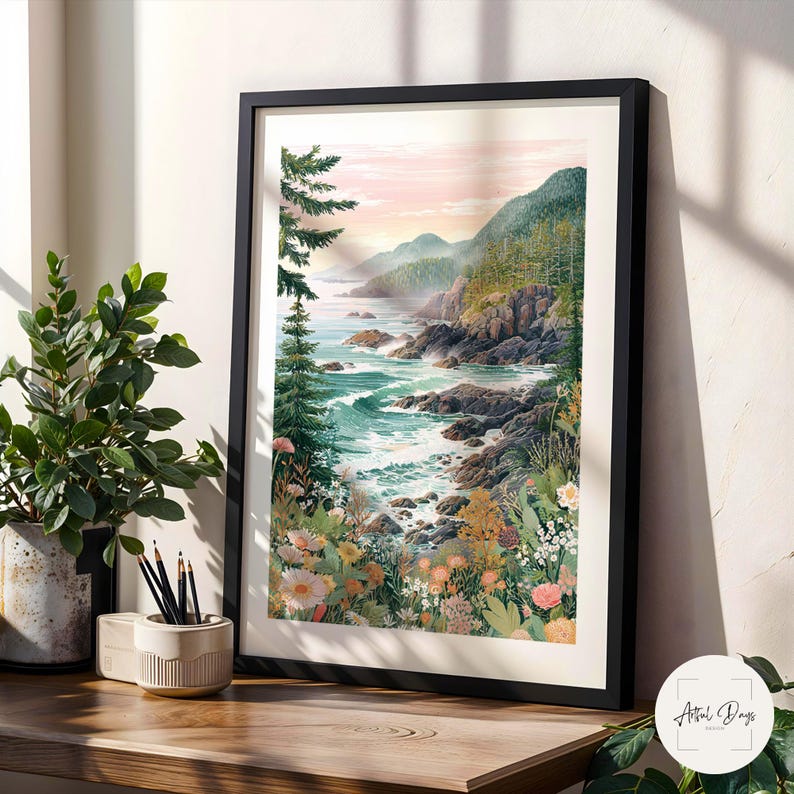 May include: A framed art print depicts a coastal landscape with a vibrant ocean, rocky shoreline, and lush green mountains. The artwork features a variety of colorful wildflowers in the foreground, with a soft, pastel-colored sky in the background.