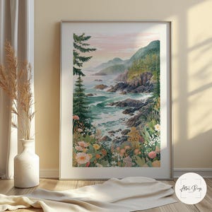 May include: A framed landscape art print depicts a coastal scene with a turquoise ocean, rocky shoreline, and lush green mountains. The artwork features a variety of wildflowers in the foreground and a soft pink and blue sky.