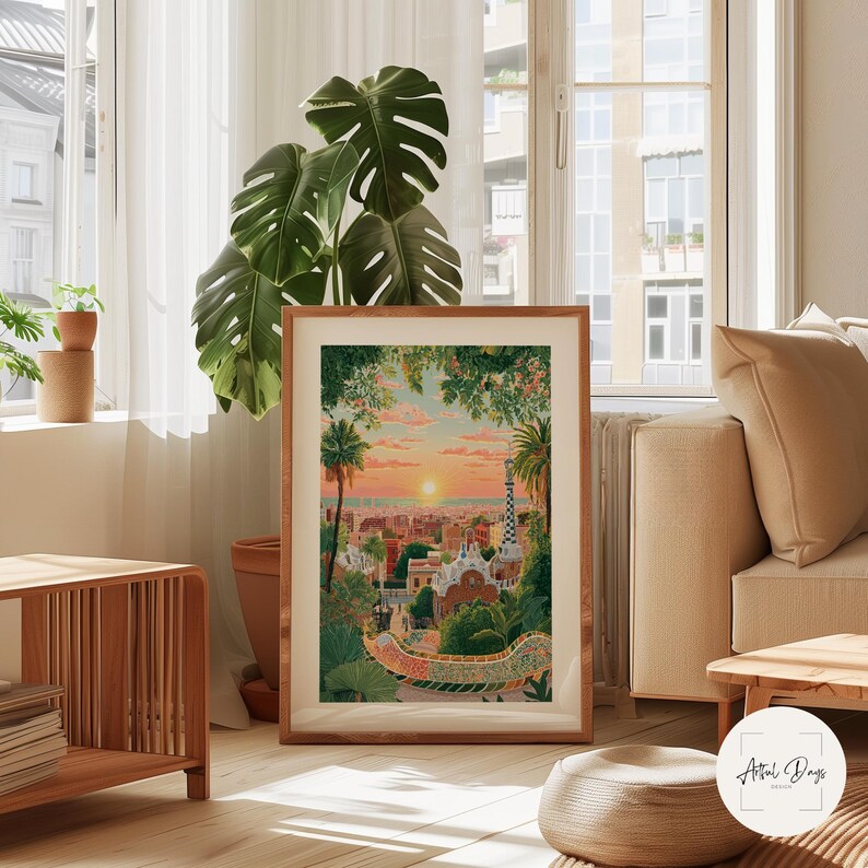 Pode incluir: Uma impress&atilde;o de arte emoldurada com um p&ocirc;r do sol sobre uma cidade com palmeiras e uma arquitetura distinta. A obra de arte est&aacute; em uma moldura de madeira e &eacute; exibida em uma sala iluminada com uma planta grande.