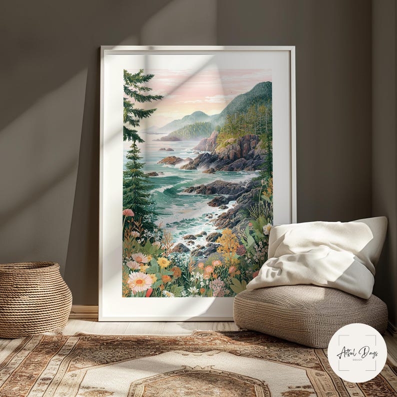 May include: A framed watercolor print of a coastal landscape. The artwork depicts a rocky shoreline with crashing waves, lush green hills, and colorful wildflowers. The sky transitions from pink to blue, creating a serene atmosphere. The print is displayed in a white frame.
