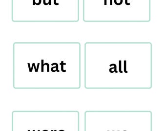 Könnte beinhalten: Sechs weiße Karten mit grünen Rändern, jede mit einem einzelnen Wort: "but", "not", "what", "all", "were" und "we".