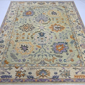 Soft Green Oushak Rug: Hand-Knotted Wool Carpet with Pastel Floral Design