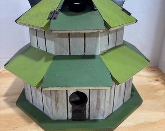Amish-made circular wooden birdhouse with a distinct green roof and white-washed siding. Apple green and other variations of green 2 tiers