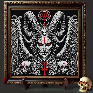 May include: A black and white cross stitch pattern of a horned demon with wings, a pentagram, and skulls. The demon has red eyes and a cross on its forehead.