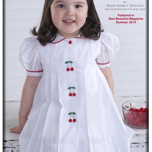 Das Cherry Dress ePattern hat die Größen 12m-4T