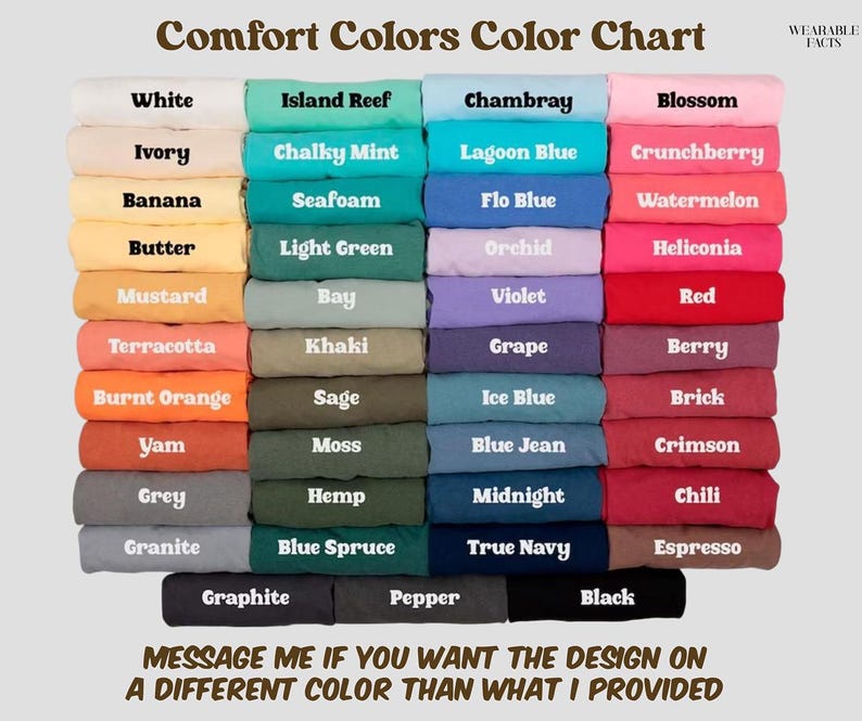 May include: A Comfort Colors color chart displaying folded fabric swatches in various shades. Text includes Comfort Colors Color Chart, Wearable Facts, and a message about requesting different colors. The grid shows white, pastels, brights, and darks.