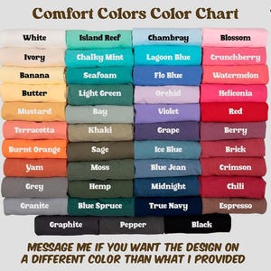 May include: A color chart titled "Comfort Colors Color Chart" displays a variety of fabric colors. The chart includes shades like white, ivory, banana, butter, mustard, terracotta, burnt orange, yam, grey, and granite. The text "MESSAGE ME IF YOU WANT THE DESIGN ON A DIFFERENT COLOR THAN WHAT I PROVIDED" is also visible.