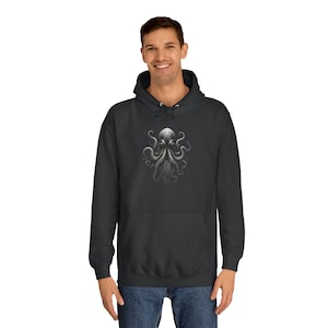 May include: A dark gray hooded sweatshirt with a graphic print of a silver octopus on the front.