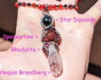 Kundalini Mata Shakti with Harlequin Brandberg Quartz, Spessartine, Star Diopside, Rhodolite, Ruby Quartz, Carnelian, Onyx, Black Tourmaline