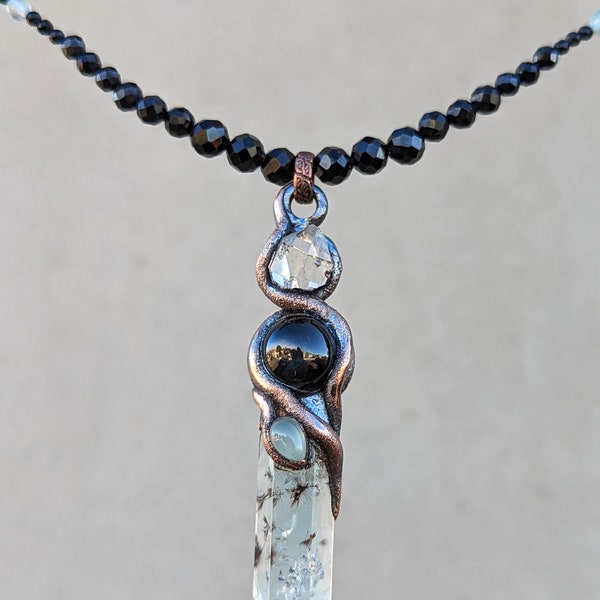 Kundalini Shakti Devi with Tantalite Aquamarine, Black Star Diopside, Herkimer Diamond, Chalcedony, Black Tourmaline, Fluorite, Clear Quartz