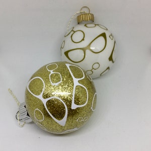 Gold and white ornament, glitter gold, round, plastic