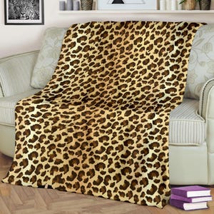 Leopardmönstrad filt | Leopardmönstrad pläd | Leopardfilt | Leopardpläd | Leopardmönstrad fleecefilt | Leopardmönstrad present