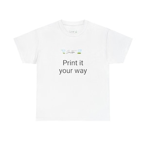 May include: A white t-shirt featuring the black text "Print it your way". The shirt has a crew neck and short sleeves. Above the text is a small logo with the text "Jim Jafar".