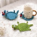 Crochet Squirrel & Lizard Mug Rug, Animal Crochet Coasters, Amigurumi Cup Holder, Cute Handmade Drink Mat, Turtle Mouse Goose Frog Coasters product logo
