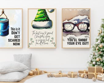 Op de afbeelding: Drie aquarel kerstprints met witte achtergronden en zwarte tekst. De eerste print toont een blauwe verfbus met een touw dat aan de bovenkant is bevestigd en de tekst "This is it DON'T GET SCARED NOW". De tweede print toont een groene kerstpet met de tekst "The best way to spread Christmas cheer is singing loud for all to hear". De derde print toont een bril met de tekst "YOU'LL SHOOT YOUR EYE OUT!"