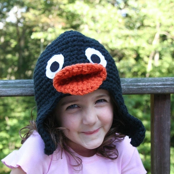 Aletas del niño tamaño pingüino personaje de ganchillo hecho a mano sombrero con orejas de ojos abiertos