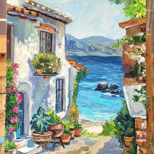 A painting of a white building with a blue door and windows, overlooking a blue ocean with a rocky shore. The building is surrounded by green plants and flowers.