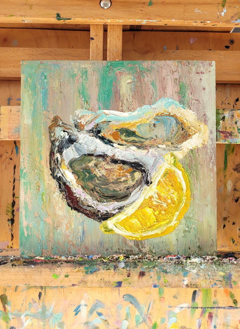 A painting of two oysters and a lemon wedge on a textured green background. The oysters are open and the lemon wedge is cut in half. The painting is done in a loose, impressionistic style.