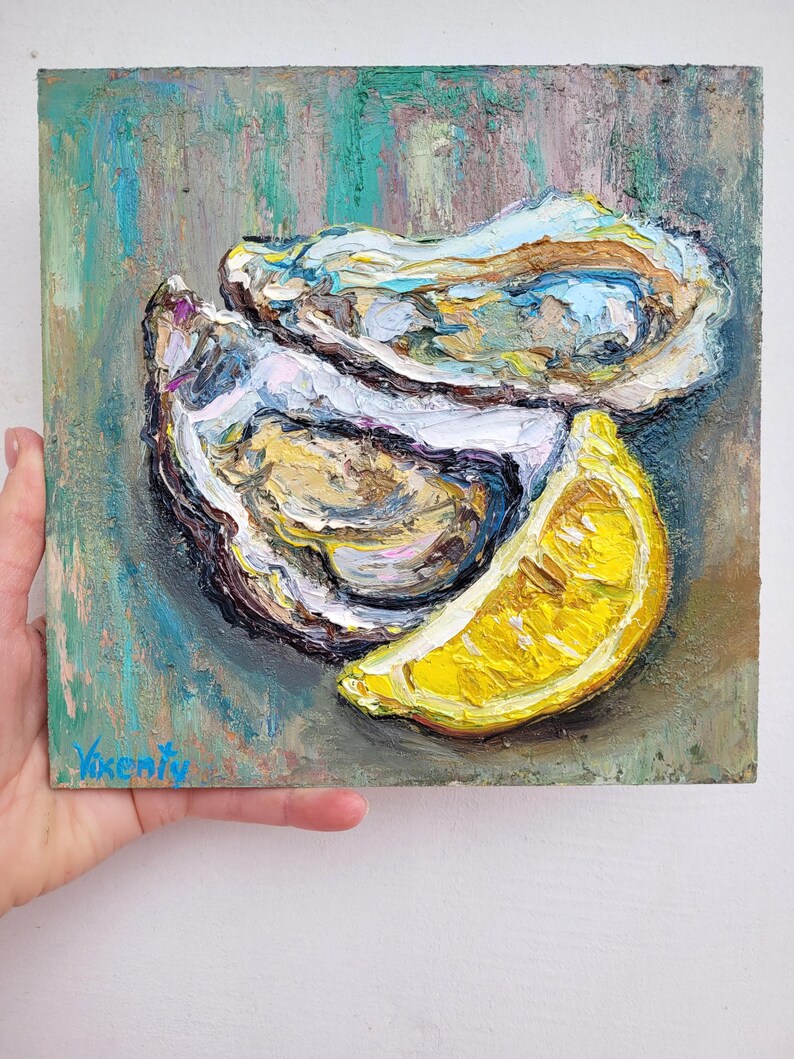 A still life painting of two oysters and a lemon wedge on a textured green background. The oysters are open and the lemon is sliced. The painting is signed "Vikenty" in the bottom left corner.