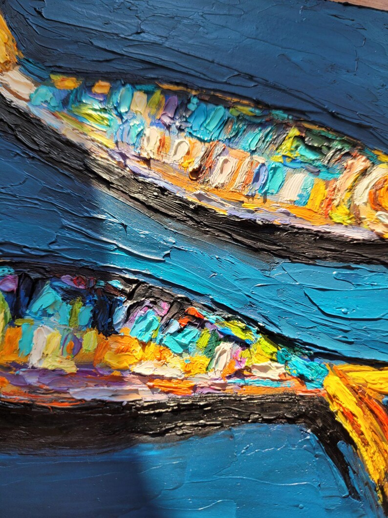 May include: An oil painting on canvas featuring two fish forms rendered with thick, impasto brushstrokes. The fish display a vibrant palette of yellow, orange, turquoise, and purple against a deep blue background, creating a textured surface.