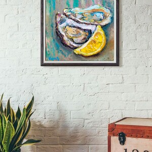 A painting of three oysters and a lemon wedge on a textured blue and green background. The oysters are arranged in a pile, with the lemon wedge resting on top. The painting is done in a loose, impressionistic style.