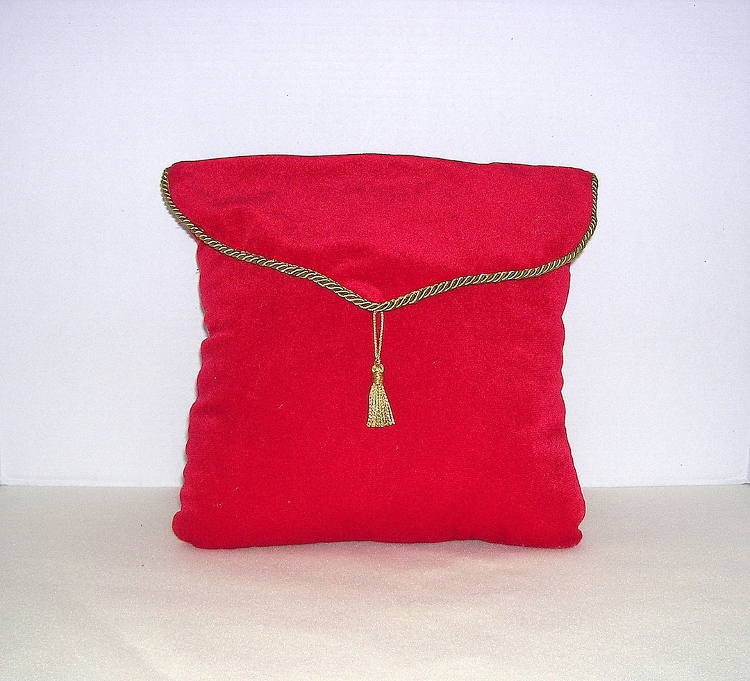 Red velvet pillow with gold tassels sales