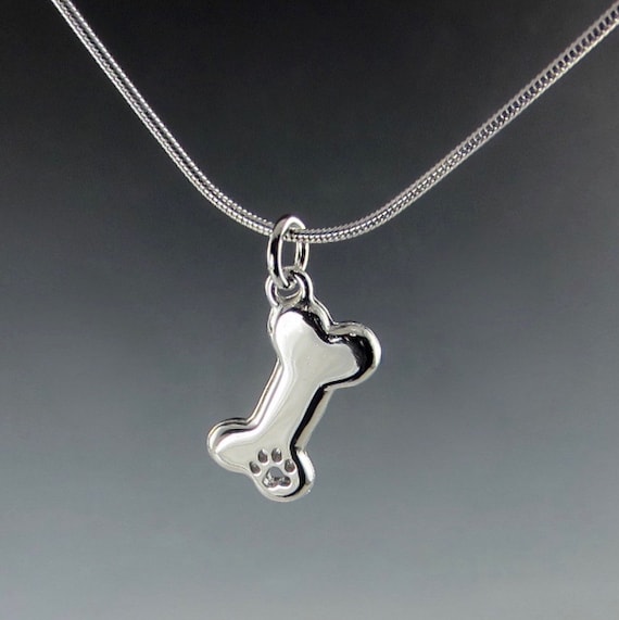 Engraved Paw Print Necklace with Bone Charm Rhodium-plated Sterling Silver Engraved Paw Print Necklace with Bone Charm Rhodium-plated Sterling Silver
