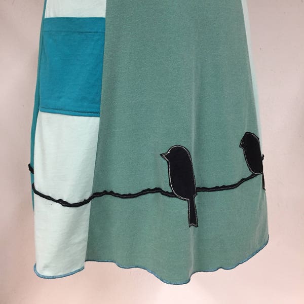 T-Skirt | upcycled, recycled green/blue t-shirt skirt with birds on a wire/branch appliqué + pocket