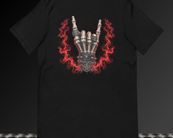 May include: A black short-sleeve t-shirt featuring a graphic print of a skeletal hand making a rock-and-roll gesture. The hand wears a spiked wristband with a pentagram charm and rings, surrounded by a circular aura of vibrant red smoke.