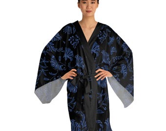 May include: A black kimono robe featuring a repeating pattern of deep blue floral motifs and leafy vines. The garment has wide, loose sleeves, a solid black collar trim, and a matching black fabric tie belt secured at the waist for closure.