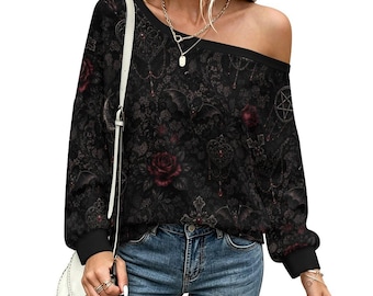 May include: A long-sleeved black pullover top featuring an all-over print of dark red roses, flying bats, intricate lace-like patterns, and pentagram symbols. The garment has a wide, rounded neckline, cuffed sleeves, and a relaxed fit throughout.