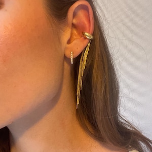 Könnte beinhalten: Rustikales Holzschild mit dem Text "Welcome to our home" in weißer Schrift. Das Schild hat eine Used-Optik und ein schlichtes, einladendes Design, ideal für den Eingangsbereich.