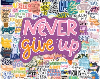 May include: A collection of colorful stickers with motivational phrases. The central sticker reads "Never Give Up" in pink and orange on a purple background. Other stickers feature phrases like "Stay", "Dream Big", and "Be Awesome".
