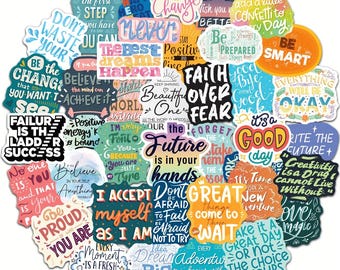 May include: A collection of colorful, die-cut stickers with inspirational quotes and phrases. The stickers feature various fonts and designs, with messages like "Believe," "Dream Big," and "Never Give Up."